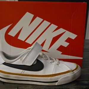 Nike Kids White, Black, and Gold Sneakers